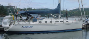 Side view of boat with stowed dinghy